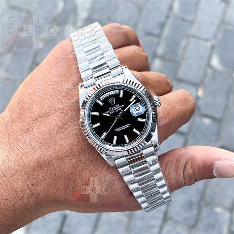 rolex platinum black dial|solid black rolex.